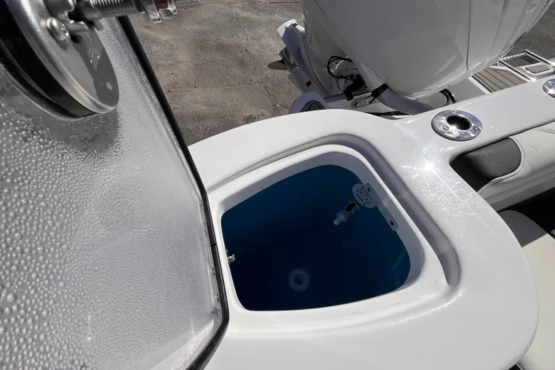 Slide: The Image of Livewell on 2026 Tidewater 232 CC Adventure boat, featuring sleek design and functionality. - 15