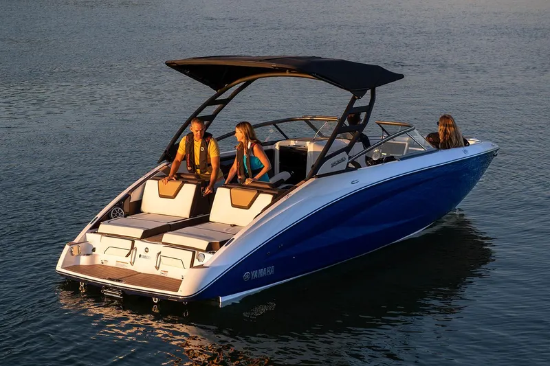 Slide: The Image of 2021 Yamaha Boats 252SD docked, featuring sleek design and spacious seating. - 6
