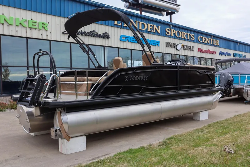 Slide: The Image of 2026 Godfrey Monaco 235 SFL pontoon boat displayed at Landen Sports Center. - 5