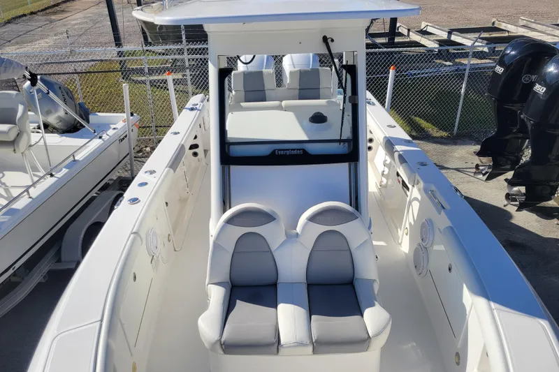 Slide: The Image of 2019 Everglades 255 Center Console boat with dual seating and modern design. - 10
