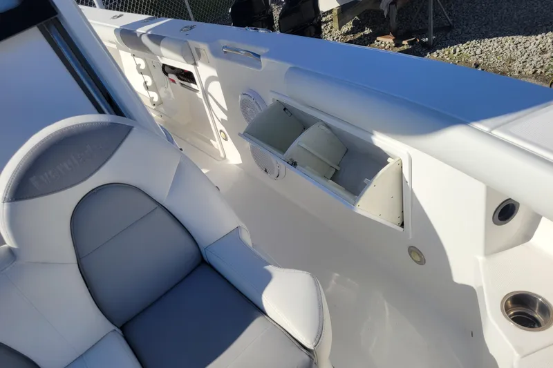 Slide: The Image of 2019 Everglades 255 Center Console boat interior with seating and storage compartments. - 4