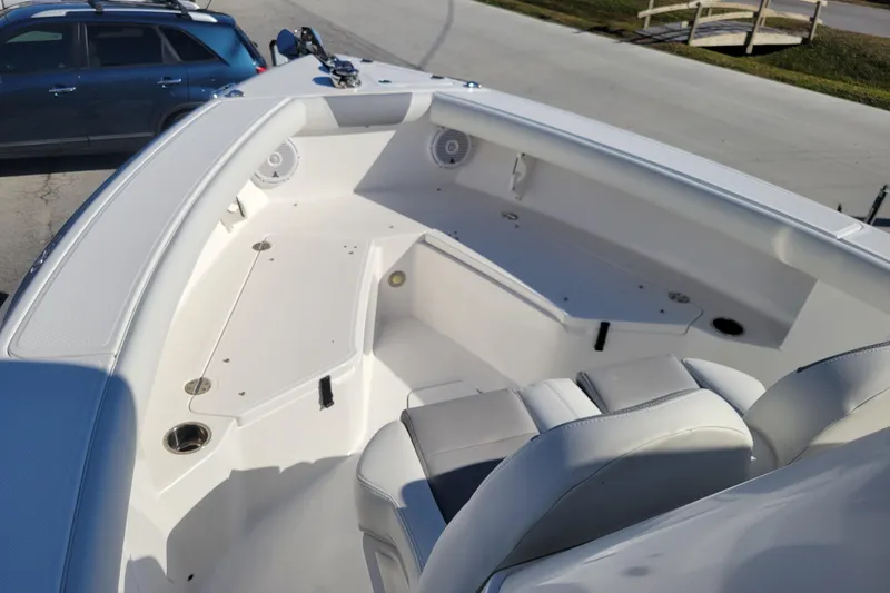 Slide: The Image of 2019 Everglades 255 Center Console boat interior with seating and cup holders. - 9