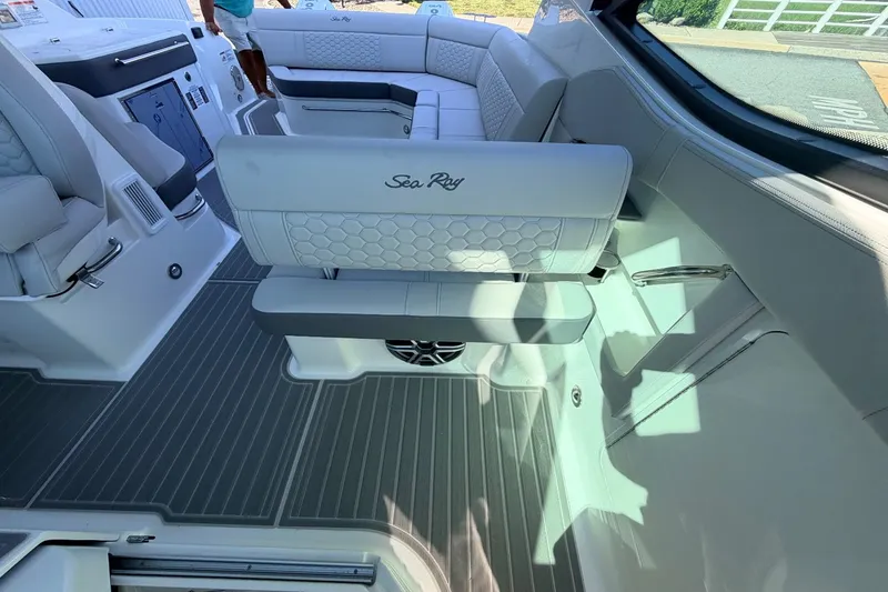 Slide: The Image of Interior of the Sea Ray Sundancer 320 Outboard with sleek seating and modern design. - 31