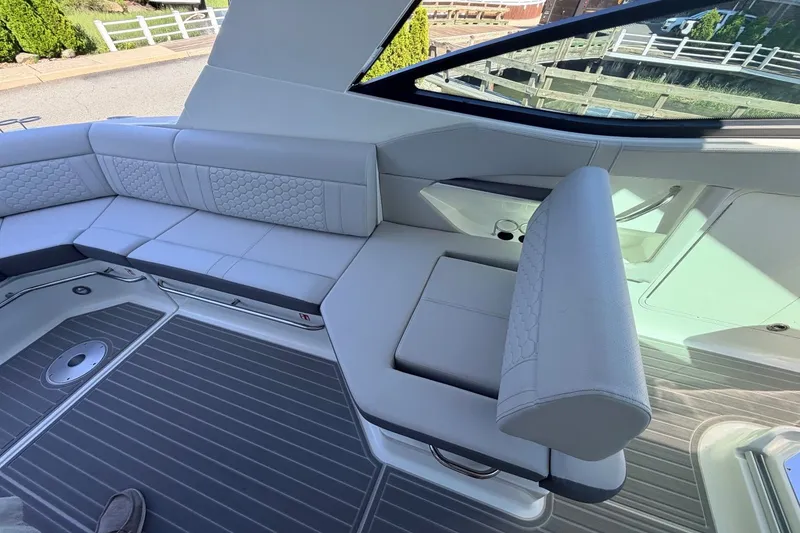 Slide: The Image of Interior of the Sea Ray Sundancer 320 Outboard with sleek seating. - 30