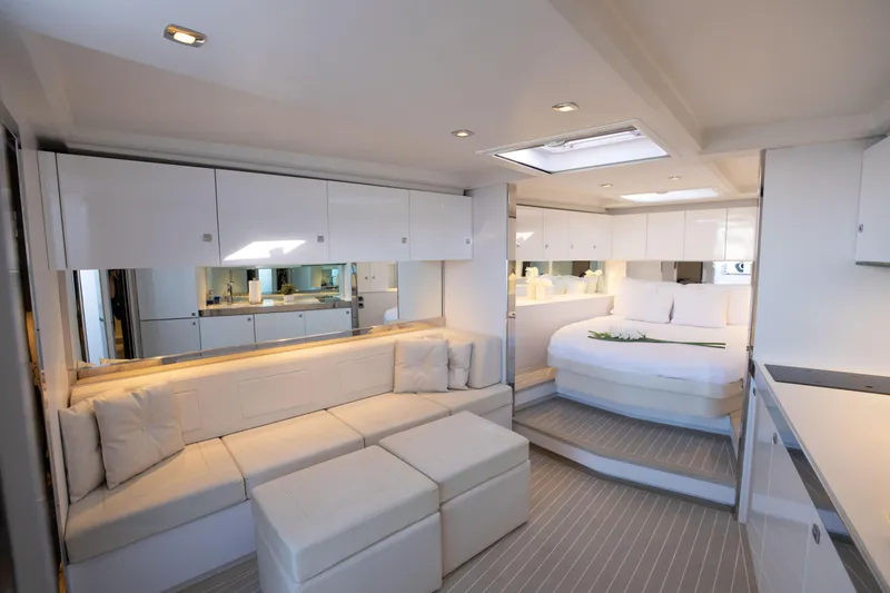 Slide: The Image of Luxurious interior of 2017 VanDutch 55 yacht with modern seating and bedroom. - 3