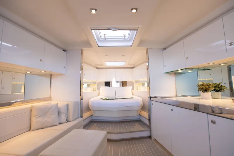 Slide: The Image of Luxurious interior of 2017 VanDutch 55 yacht with modern white furnishings and elegant design. - 5
