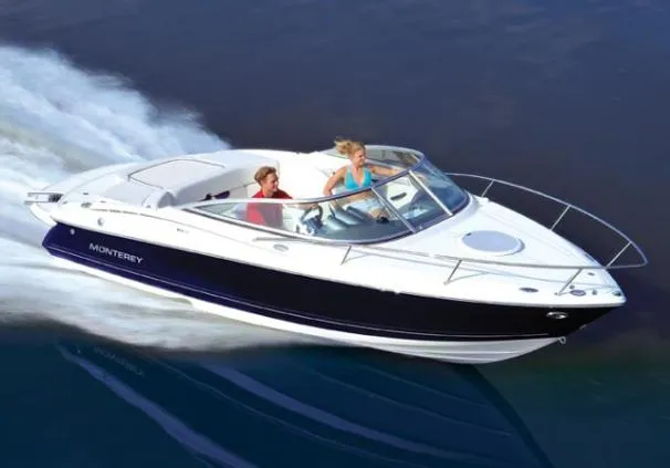 The Image of 2008 Monterey 214FS boat on trailer in indoor showroom. - 0