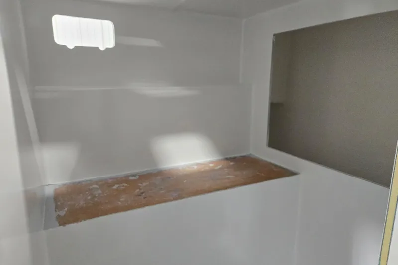 Slide: The Image of Interior view of a 2025 Calvin Beal Sedan, showcasing unfinished cabin details. - 50