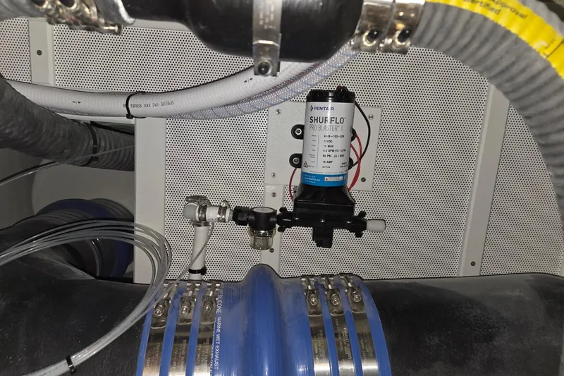 Slide: The Image of Engine compartment of a 2025 Calvin Beal Sedan with Shurflo Pro Blaster II pump. - 72