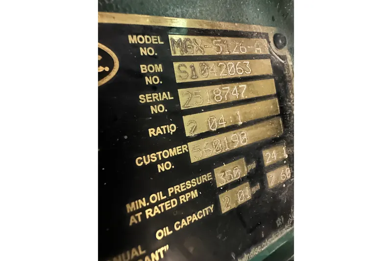 Slide: The Image of Close-up of a Calvin Beal 2025 sedan's identification plate with model and serial numbers. - 86