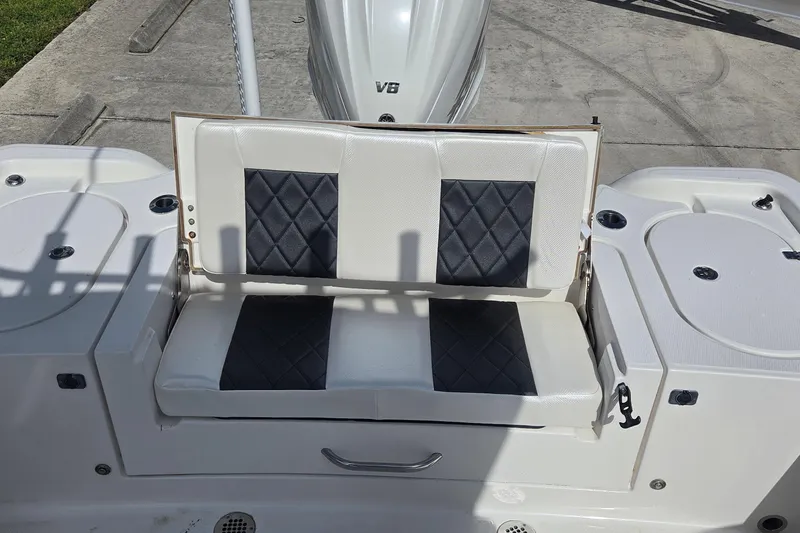 Slide: The Image of 2020 Blue Wave 2800 Makaira boat seat with diamond-patterned upholstery. - 22