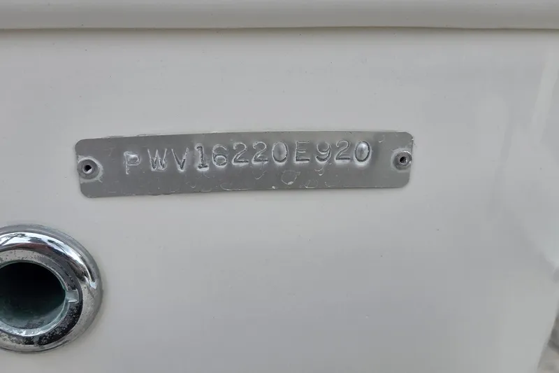 Slide: The Image of 2020 Blue Wave 2800 Makaira hull identification number plate. - 24