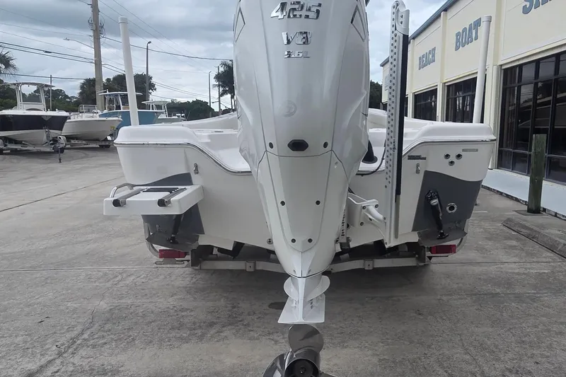 Slide: The Image of Rear view of 2020 Blue Wave 2800 Makaira boat with powerful outboard motor. - 3