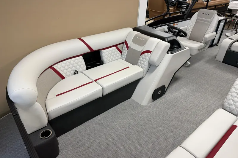 Slide: The Image of 2026 Crest Conquest 230 SLSC boat interior with elegant seating and modern design. - 3