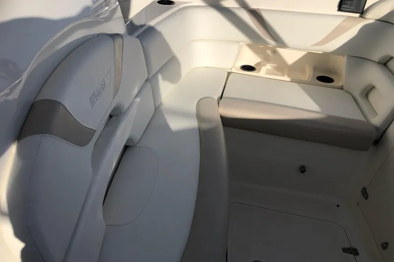 Slide: The Image of 2009 Boston Whaler 320 Outrage Cuddy Cabin interior seating with cup holders. - 10
