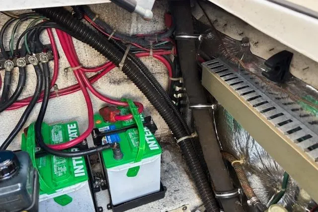 Slide: The Image of Electrical system of a 2002 Regal Commodore 2765 boat with batteries and wiring. - 20