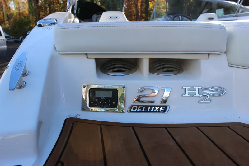 Slide: The Image of 2017 Chaparral 21 H2O Ski & Fish boat, rear view with deluxe branding. - 26