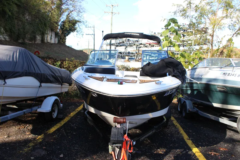 Slide: The Image of 2017 Chaparral 21 H2O Ski & Fish boat parked outdoors. - 29