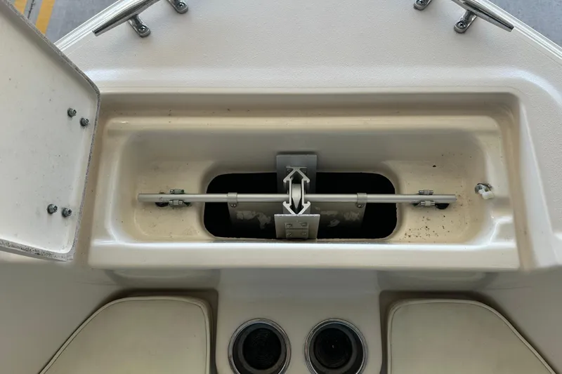 Slide: The Image of Open storage compartment on a 1995 Grady-White Tournament 192 boat. - 15