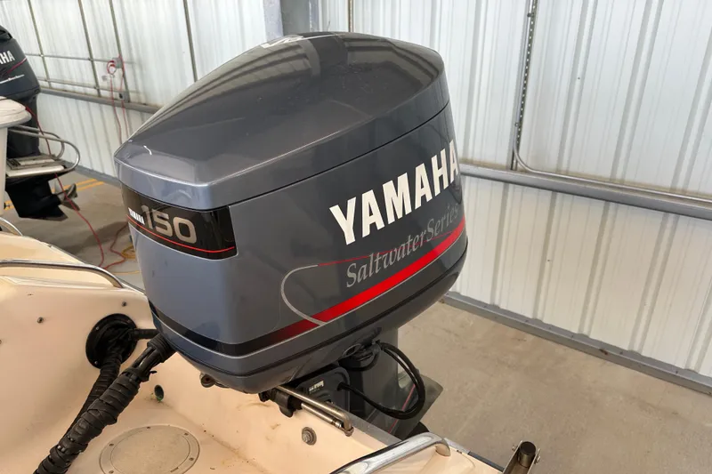 Slide: The Image of Yamaha 150 Saltwater Series outboard motor on 1995 Grady-White Tournament 192 boat. - 41