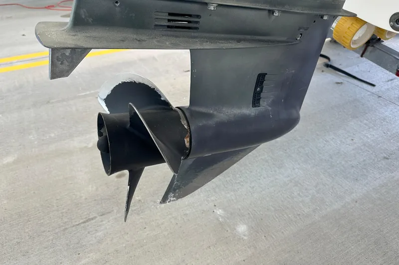 Slide: The Image of Propeller of a 1995 Grady-White Tournament 192 boat on concrete surface. - 47