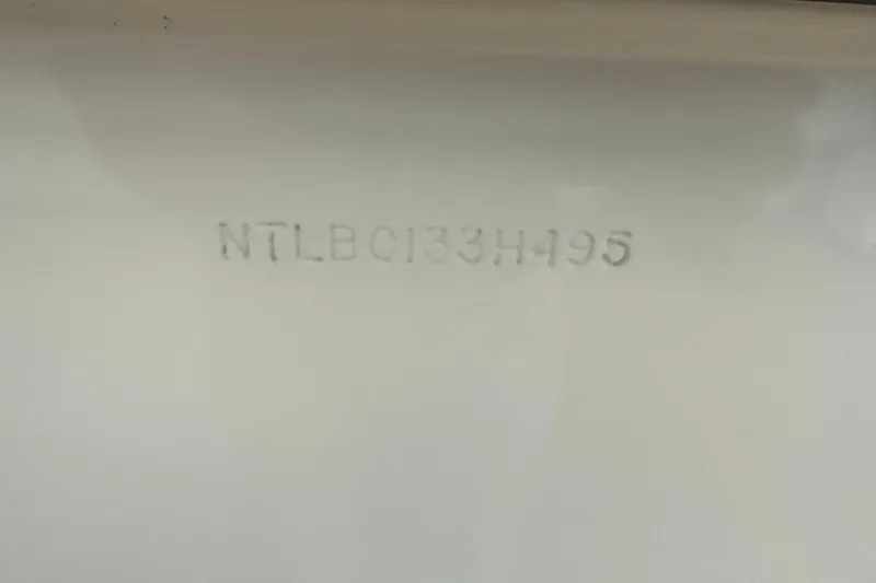 Slide: The Image of 1995 Grady-White Tournament 192 boat hull identification number: NTLB0133H495. - 51