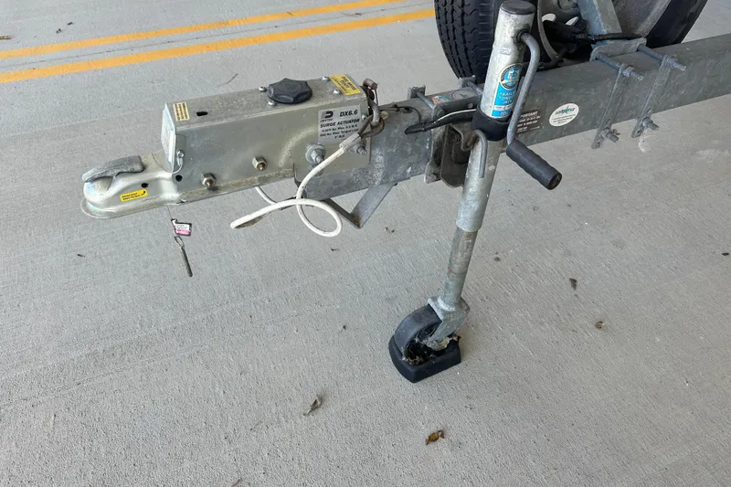 Slide: The Image of Trailer hitch and jack stand for 1995 Grady-White Tournament 192 boat. - 9
