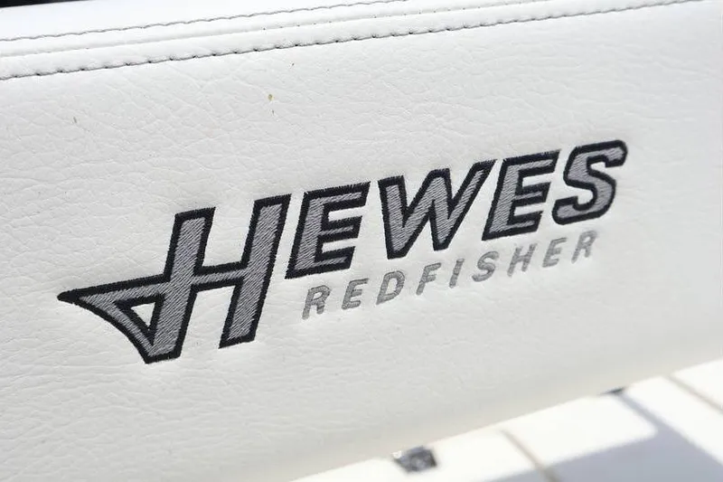 Slide: The Image of 2025 Hewes Redfisher 18 boat deck with Yamaha 150 engine. - 7