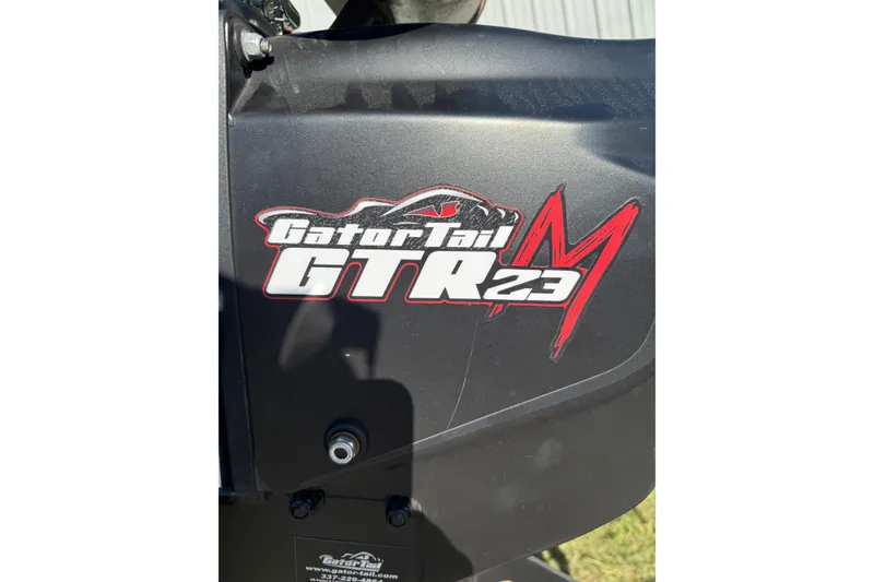 Slide: The Image of 2025 Alweld 1442 DS boat with Gator Tail GTR23M logo, black exterior. - 5