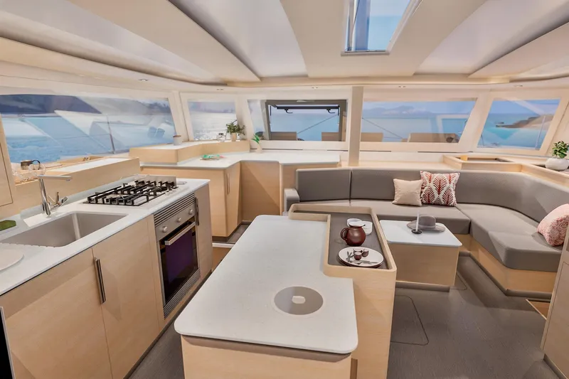 Slide: The Image of Luxurious interior of 2026 Fountaine Pajot 48 yacht with modern kitchen and seating area. - 10