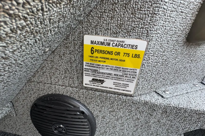 Slide: The Image of 2026 Lund 1775 Adventure Sport capacity label, 6 persons or 775 lbs, 115 HP motor. - 29