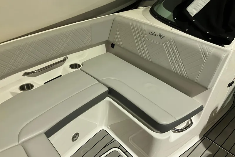 Slide: The Image of 2025 Sea Ray SDX 270 Outboard interior seating with elegant upholstery and modern design. - 19