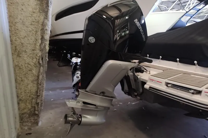 Slide: The Image of 2025 Sea Ray SDX 270 Outboard with Mercury engine in a storage facility. - 3