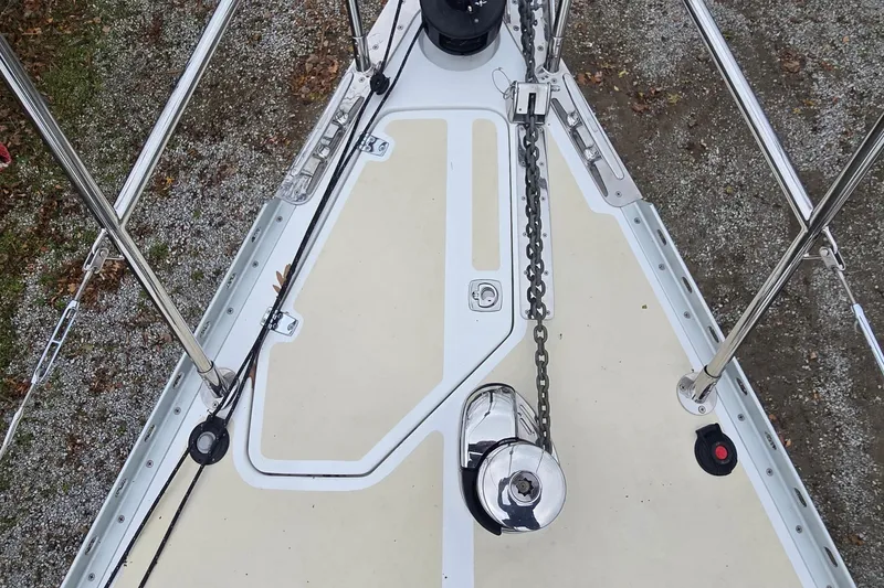 Slide: The Image of Bow of a 2018 Tartan 345 sailboat with anchor chain and winch. - 31