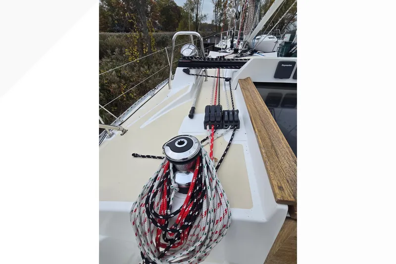 Slide: The Image of Sailboat deck of 2018 Tartan 345 with ropes and winch. - 42