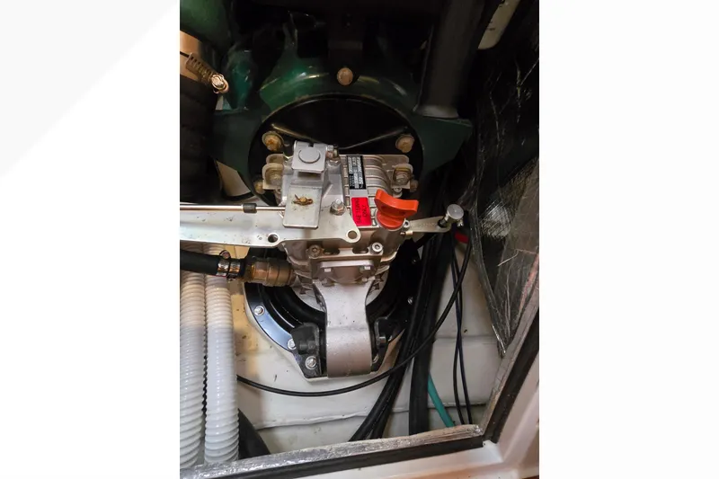 Slide: The Image of Engine compartment of a 2018 Tartan 345 sailboat, showcasing mechanical components. - 47