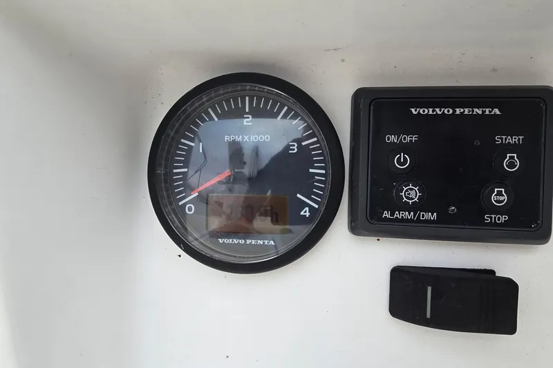 Slide: The Image of Volvo Penta tachometer and control panel on 2018 Tartan 345 boat dashboard. - 51