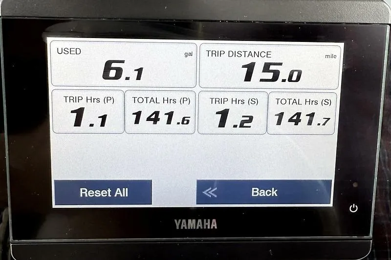 Slide: The Image of Yamaha display showing fuel usage and trip data for 2022 Edgewater 262CC boat. - 31