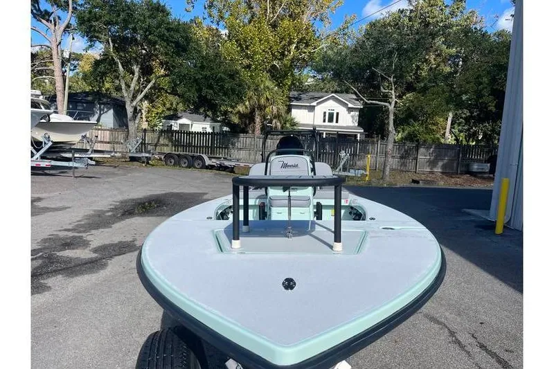 Slide: The Image of 2026 Maverick 18 HPX-V boat on trailer in outdoor showroom. - 2