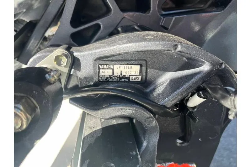 Slide: The Image of 2026 Maverick 18 HPX-V boat transom with identification plate in sunlight. - 8