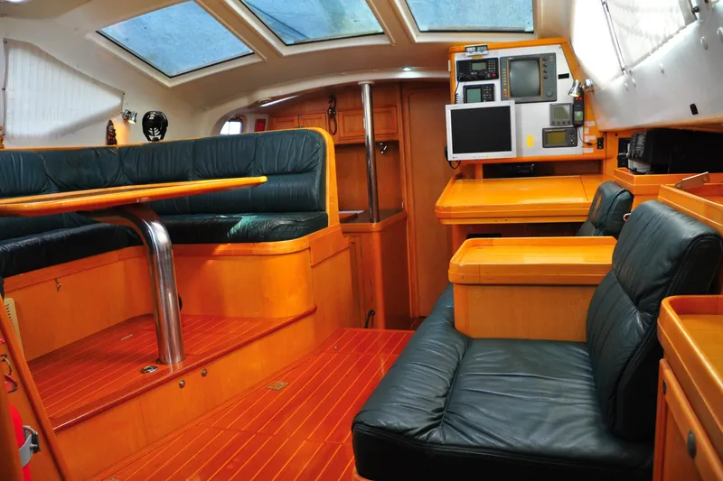 Slide: The Image of Luxurious interior of 2000 Custom Steel Cutter World Cruiser yacht with leather seating. - 12