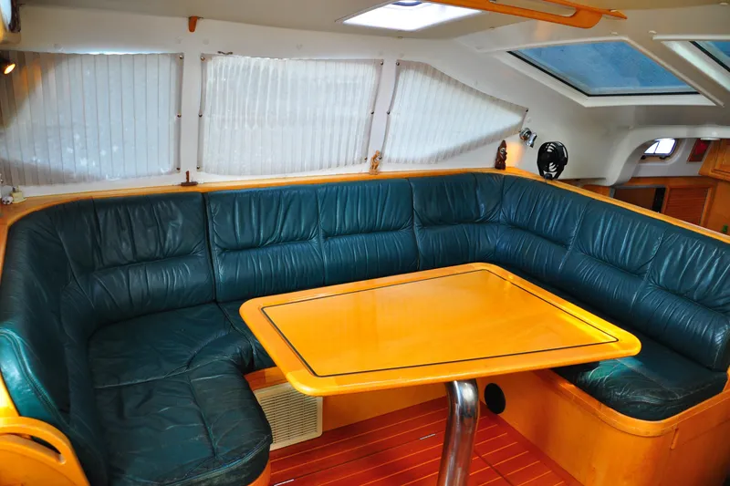 Slide: The Image of Luxurious interior of 2000 Custom Steel Cutter World Cruiser yacht with leather seating. - 14