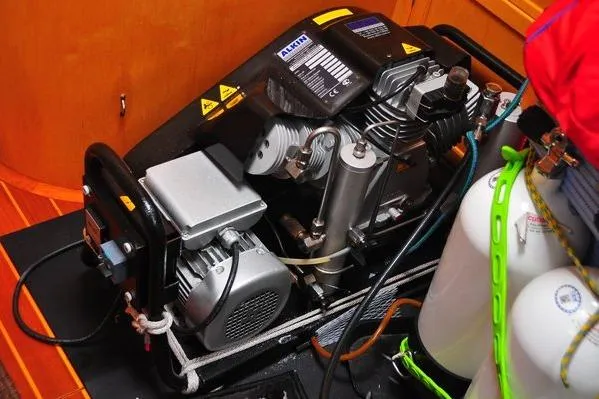 Slide: The Image of Engine room of 2000 Custom Steel Cutter World Cruiser with compressor and equipment. - 8