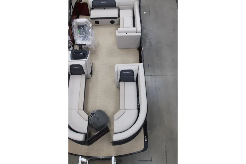 Slide: The Image of 2026 Harris Cruiser 230 pontoon boat interior with spacious seating layout. - 2
