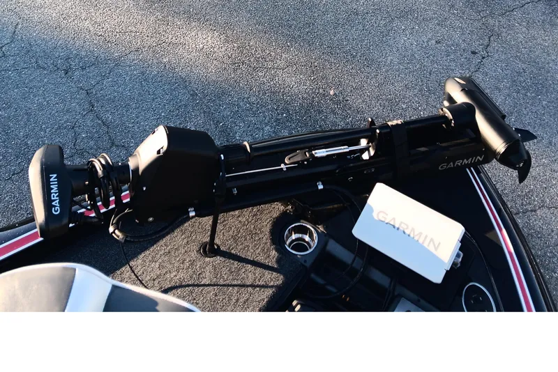 Slide: The Image of Triton 18 TrX 2026 boat with Garmin trolling motor and equipment on deck. - 9