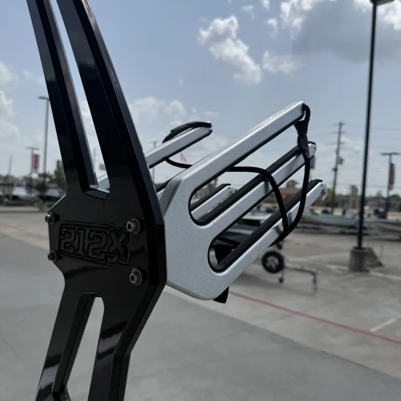 Slide: The Image of Close-up of a black and silver wakeboard rack on a Yamaha 212X boat. - 29