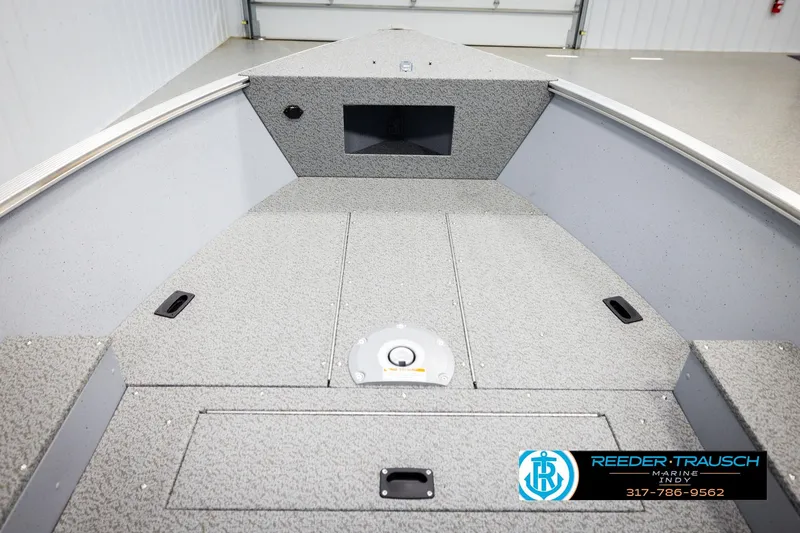 Slide: The Image of 2026 Lund 1600 Fury Tiller boat interior with storage compartments, gray finish. - 22