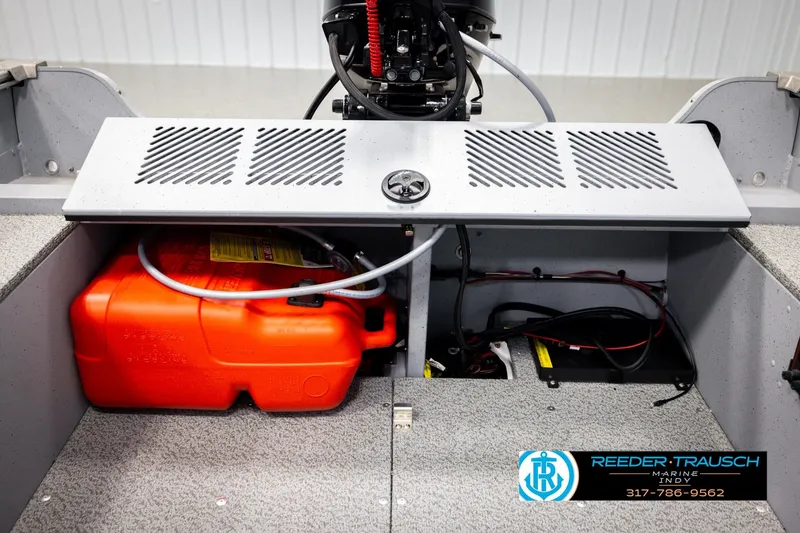 Slide: The Image of 2026 Lund 1600 Fury Tiller boat interior with fuel tank and wiring. - 25