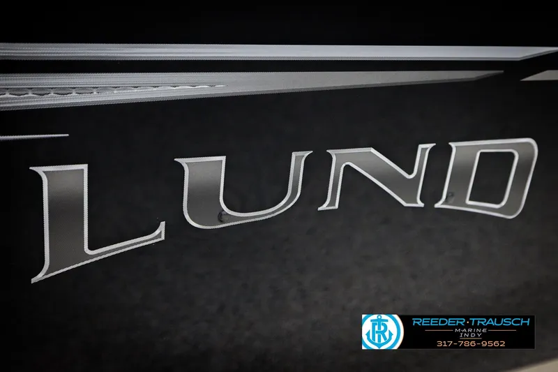 Slide: The Image of 2026 Lund 1600 Fury Tiller boat logo with Reeder Trausch Marine contact details. - 36
