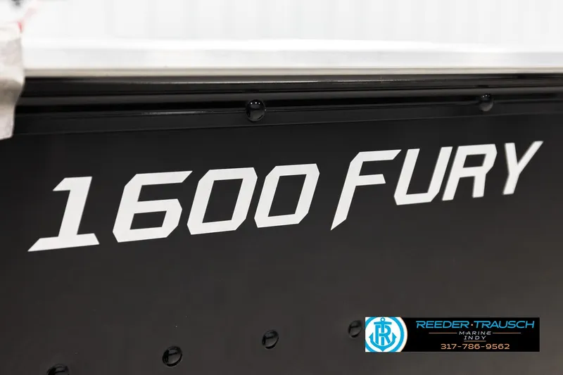 Slide: The Image of 2026 Lund 1600 Fury Tiller boat branding with Reeder-Trausch Marine logo. - 37